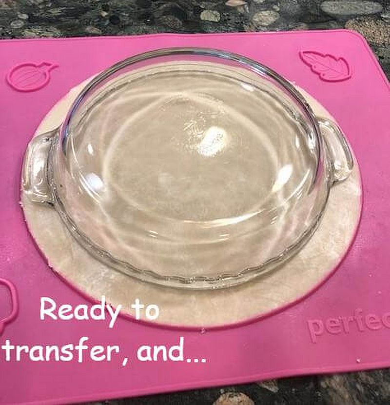 Transferring pie dough to dish