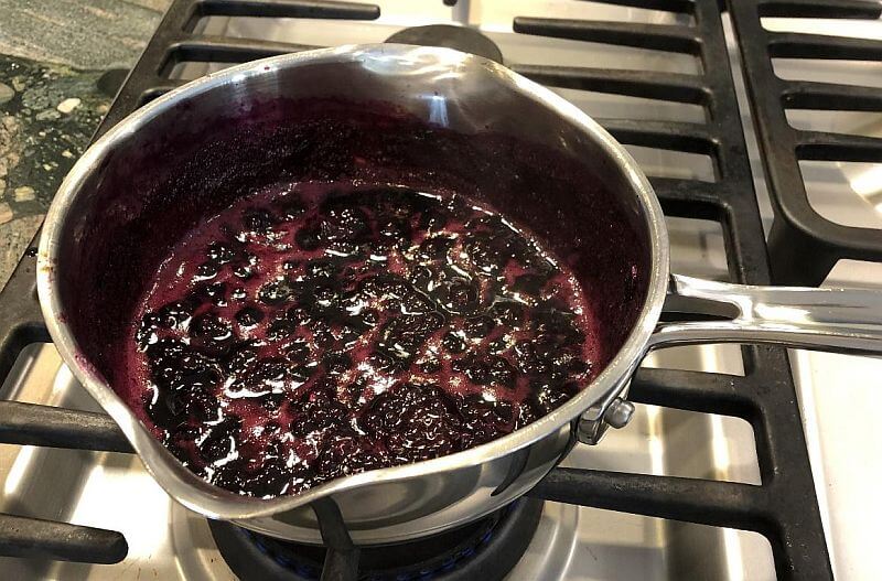 Blueberries cooking on the stove