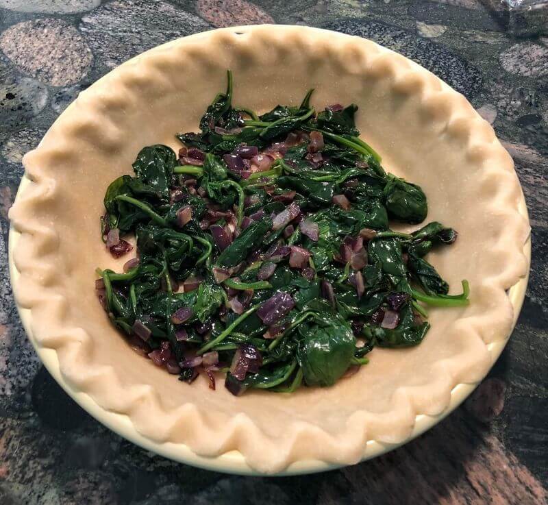 spinach onion mixture in Pie crust