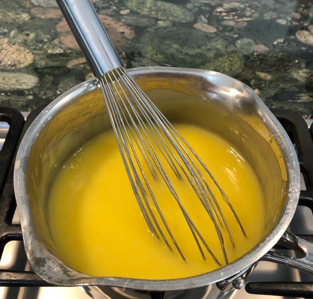 Mixture for pie filling being heated on stove